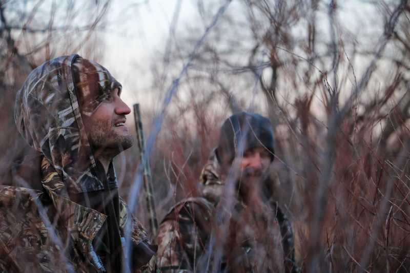 Hunters in a field